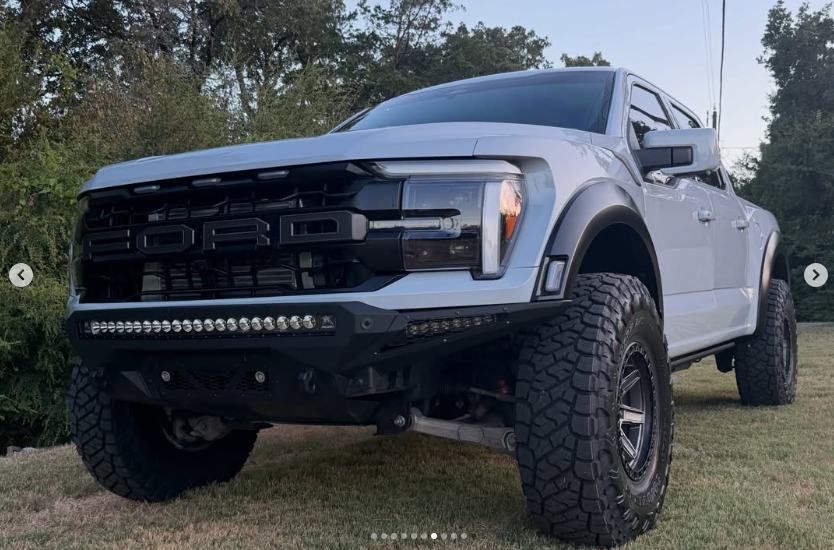 White Ford Raptor with front bumper and integrated lighting