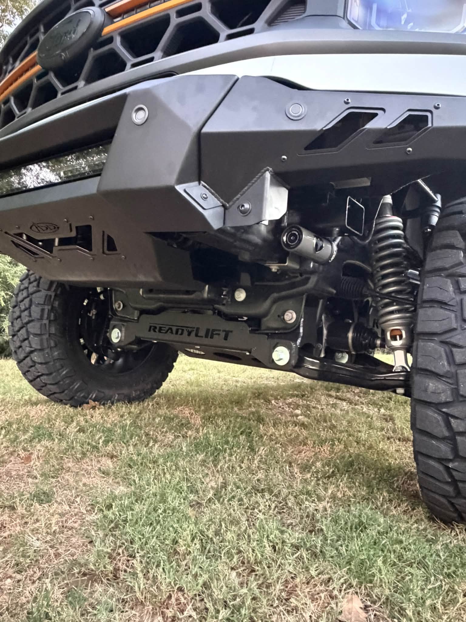Close-up of the front bumper, suspension and Falcon shock.