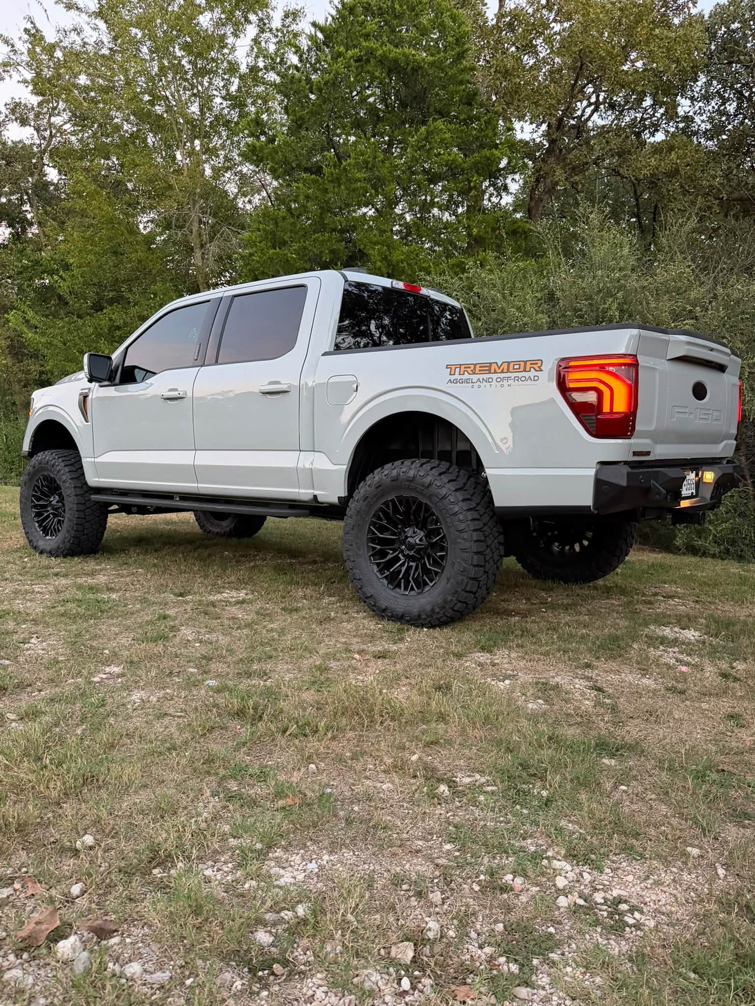 Rear side view of the Tremor showing its wheel and tire stance.